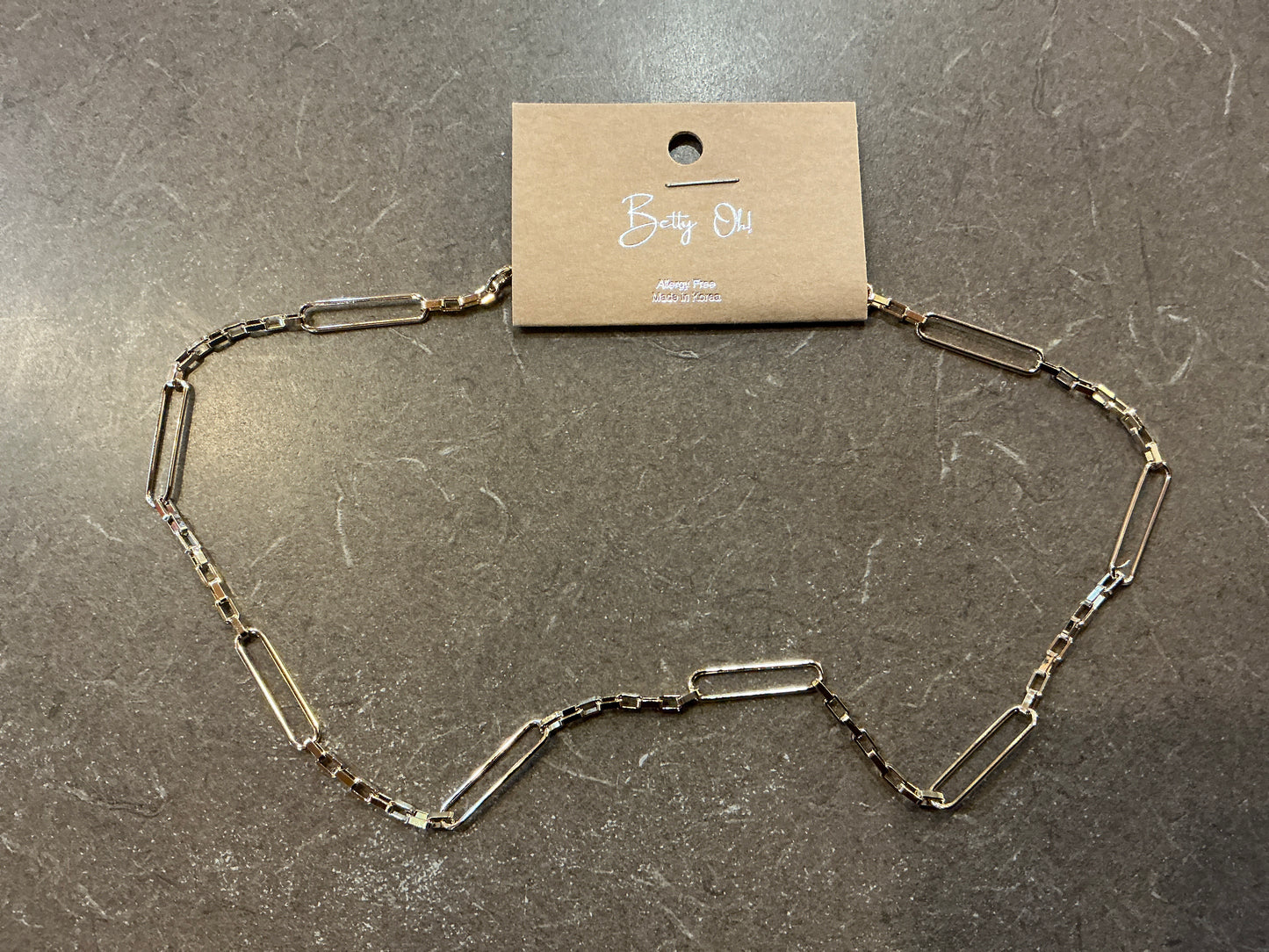 Gold tone mixed link necklace