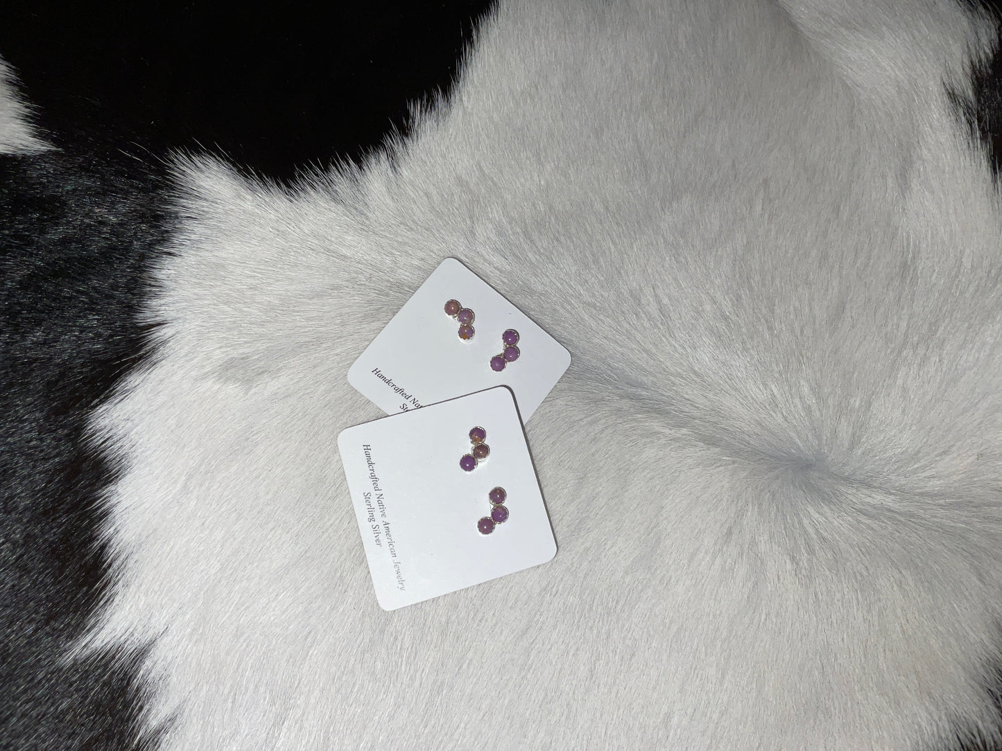 Three stone purple cluster