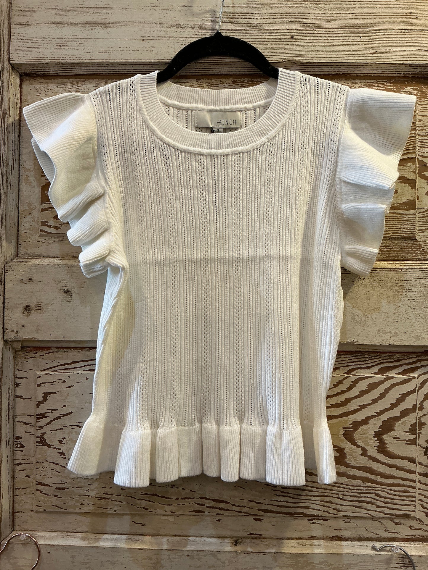 Ivory Ruffled Hem Knit Top