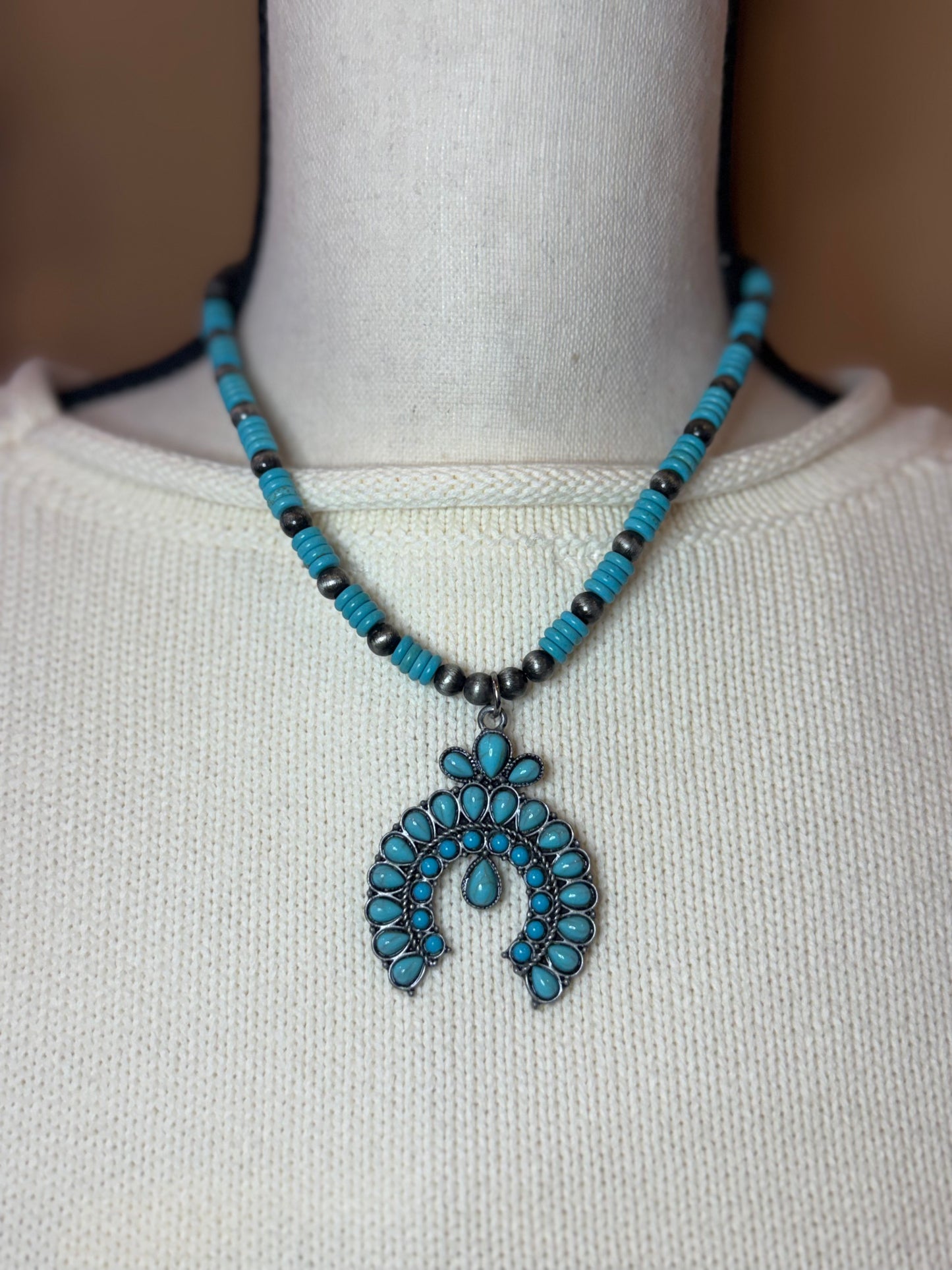 Turquoise squash blossom