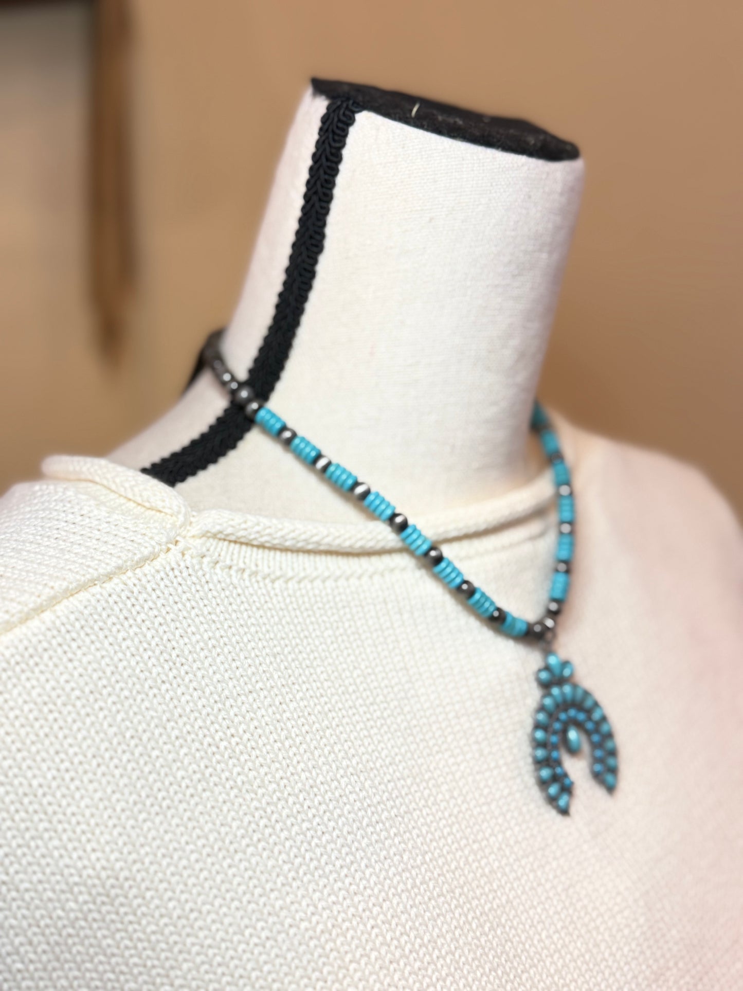 Turquoise squash blossom
